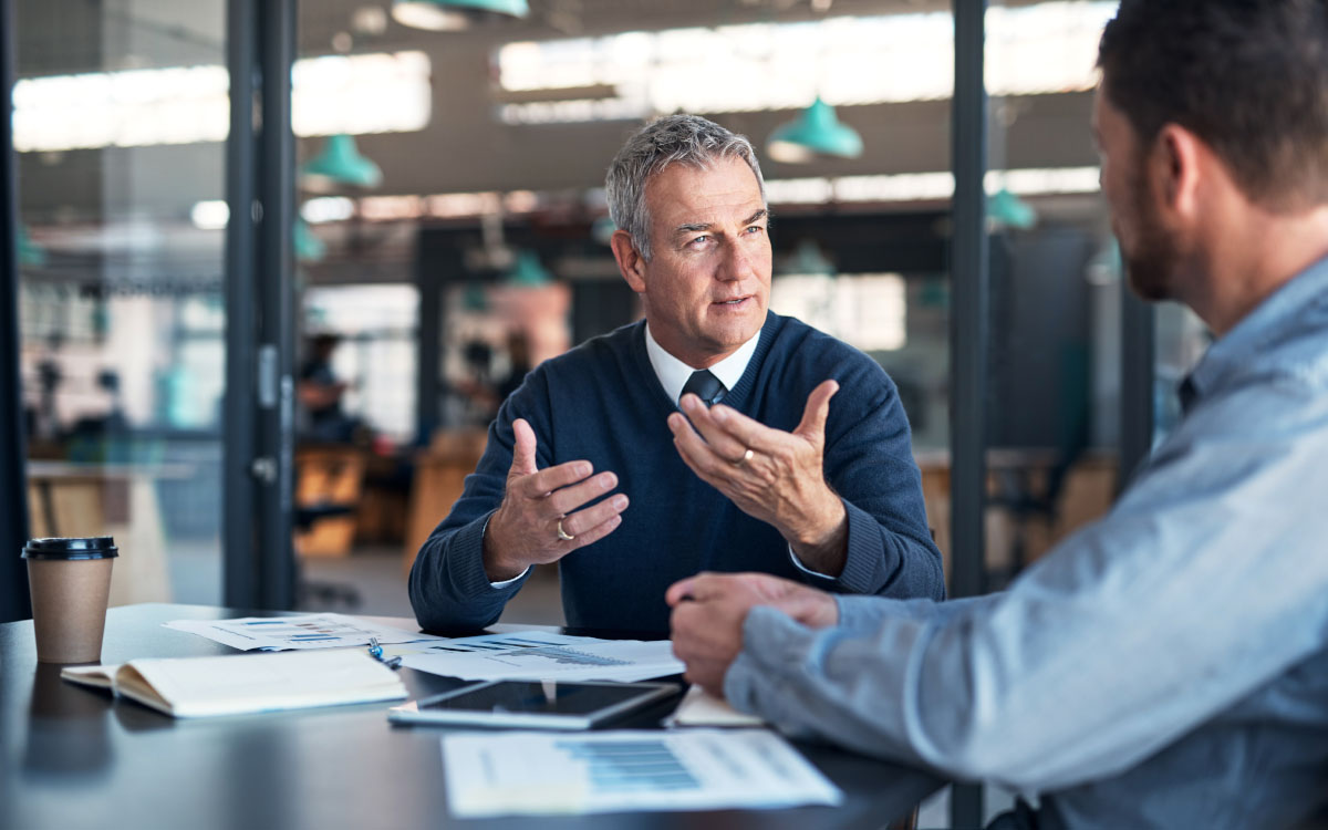 Two men having a discussion 