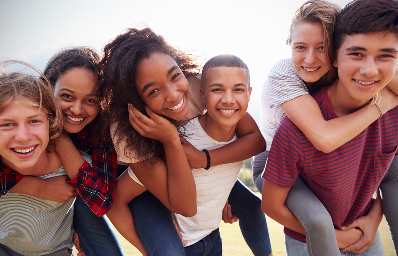 Six Children Smiling and Playing